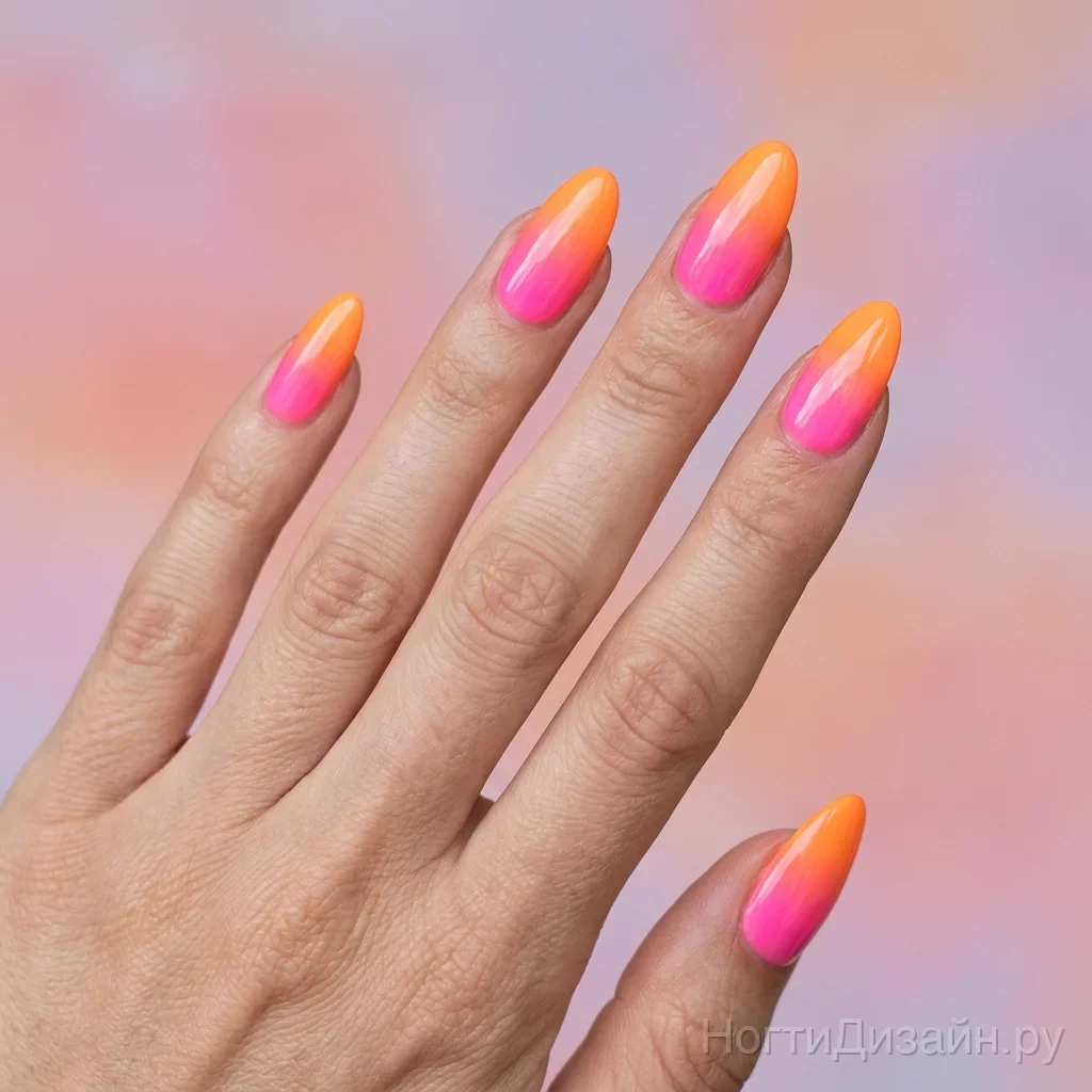 Bright vibrant neon pink to orange sunset gradient ombre nails